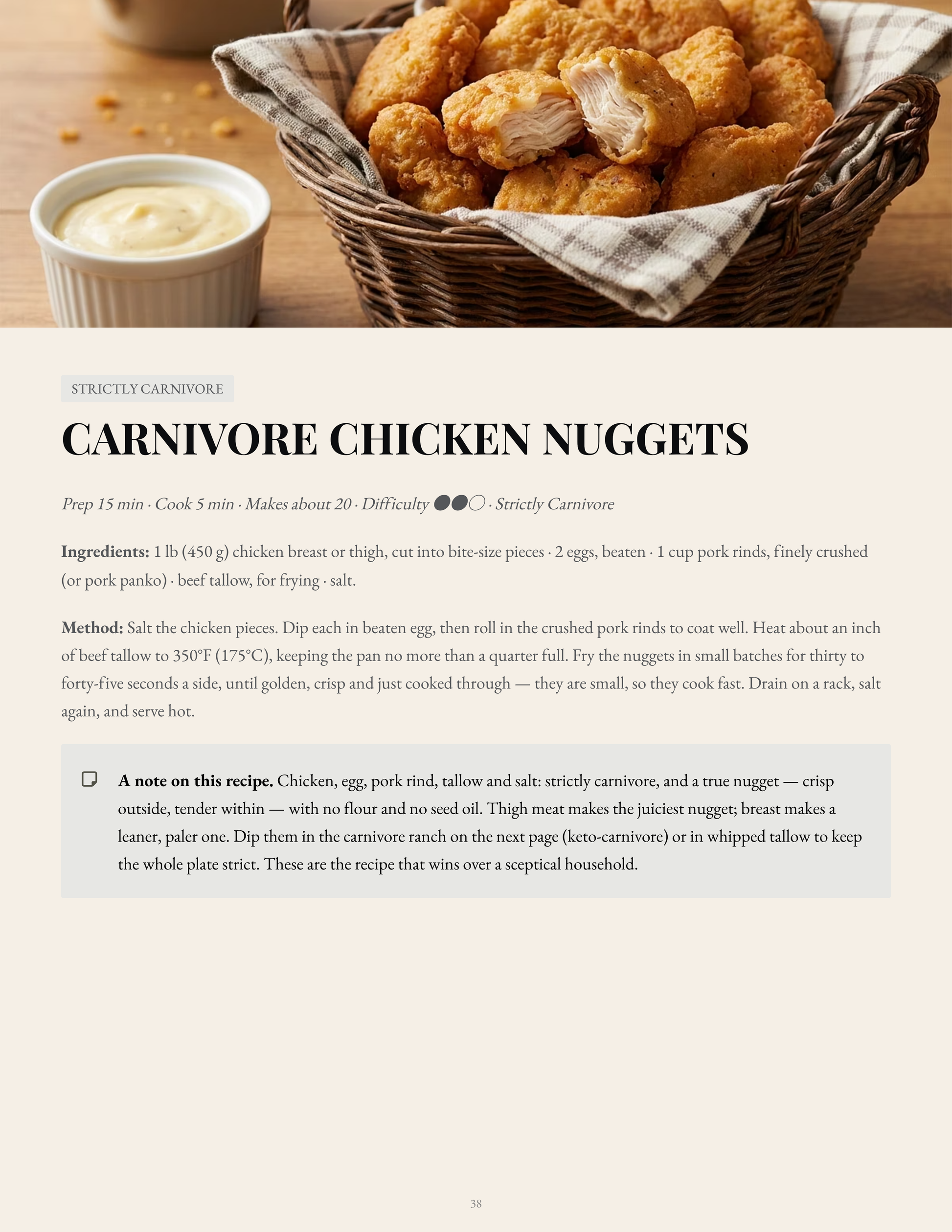 A recipe card page for 'Carnivore Chicken Nuggets' from Strictly Carnivore, featuring a photo of a basket of carnivore chicken nuggets, a side of creamy sauce, and recipe text with ingredients and instructions.